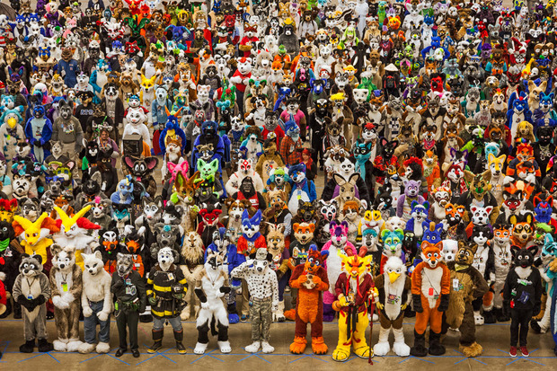A very large number of people in furry costumes posing