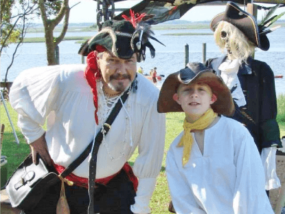 Mad Dog Mike, a young pirate, and a pirate skeleton